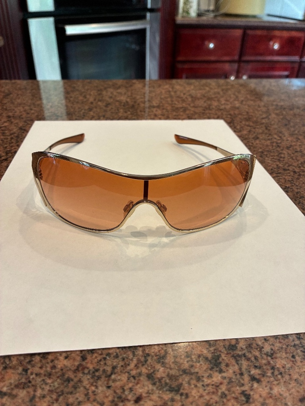 Oakley Goldtone Rimmed Sunglasses